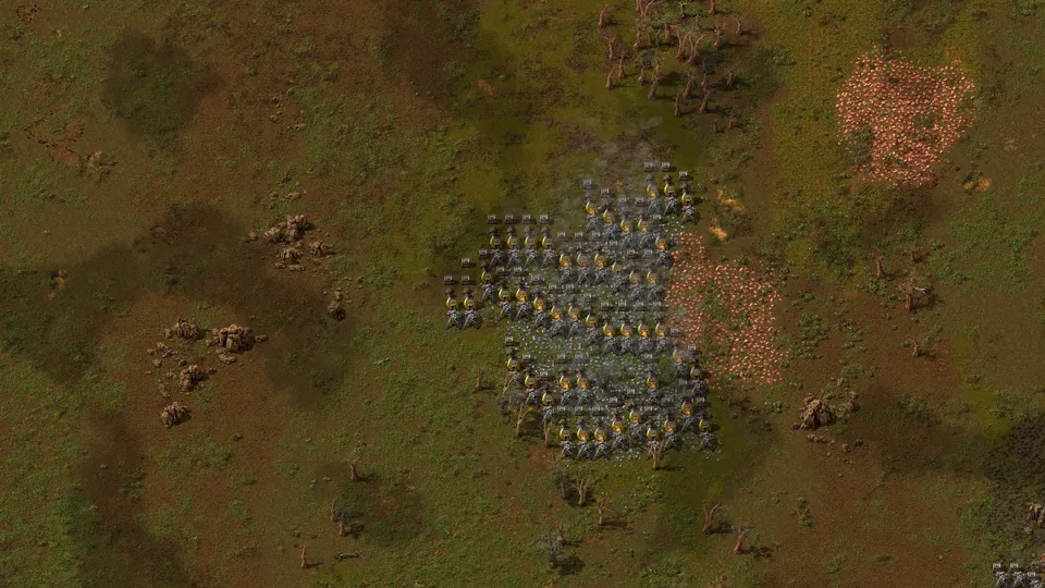 Factorio: a dense block of burner drills, stone furnaces and chests placed in rows